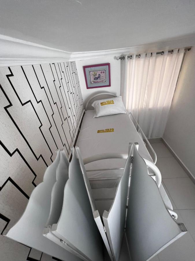 Hotel1325 Bani Bagian luar foto